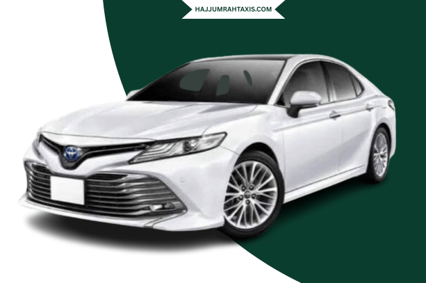 Toyota Camry 4-seater luxury sedan parked outdoors.